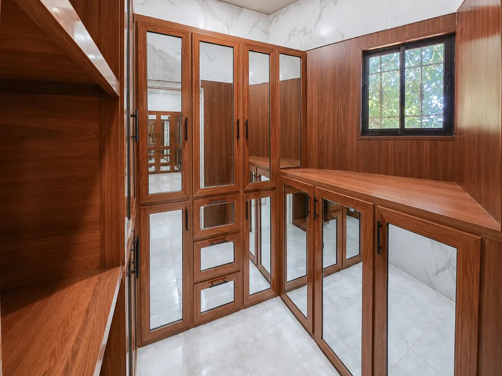 The fitted walk-in wardrobe