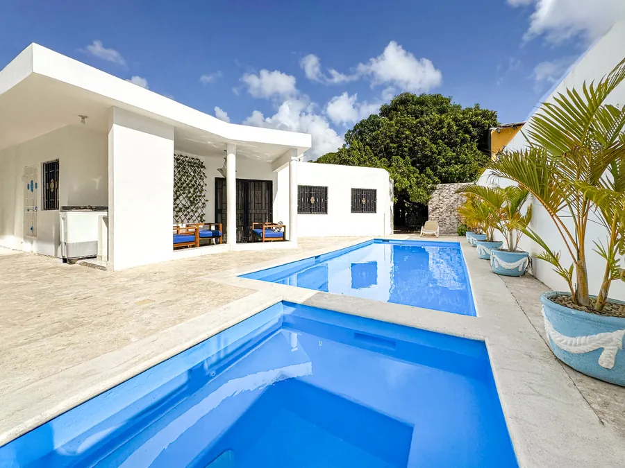 The pool and jacuzzi from the corner of the terrace