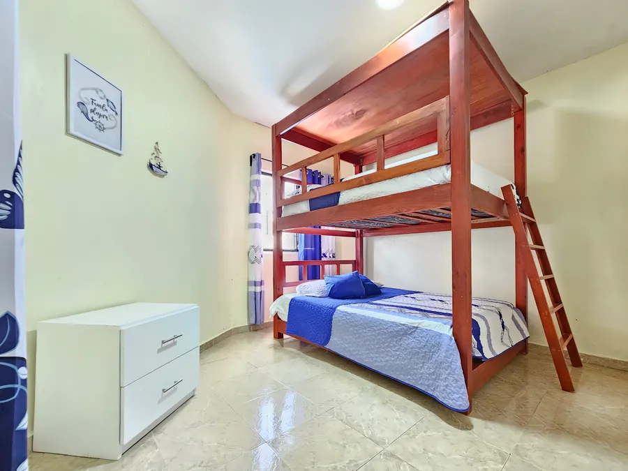 A bunk room: double below, single above