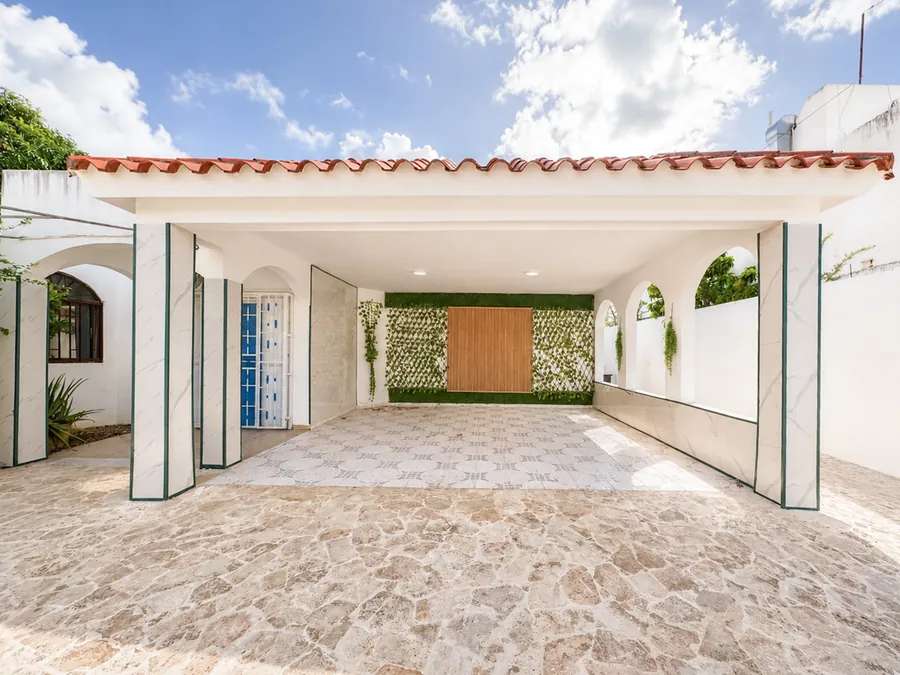 The covered carport, room for four cars