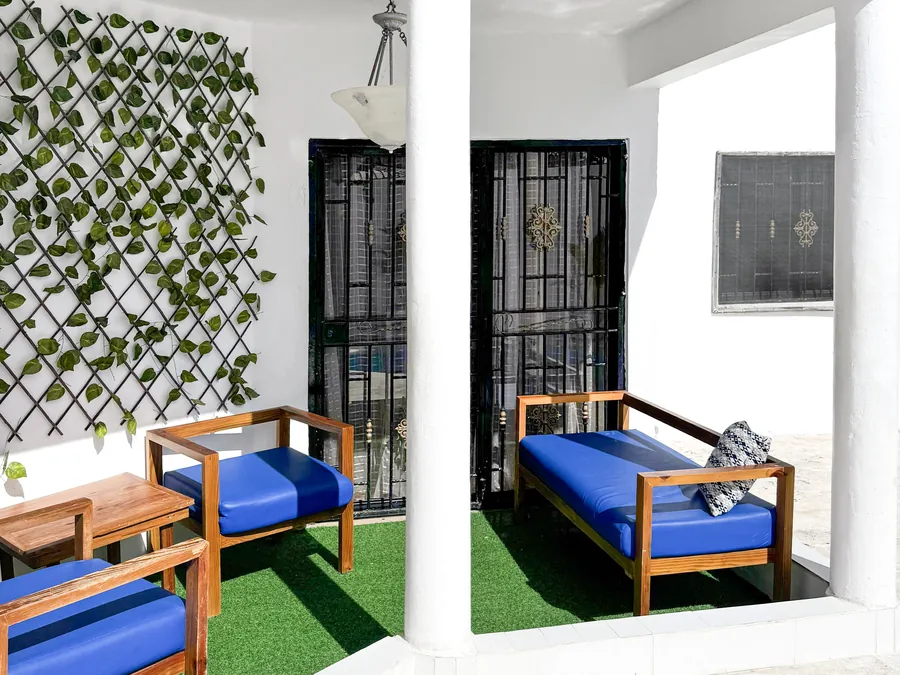 A sheltered corner with a green wall
