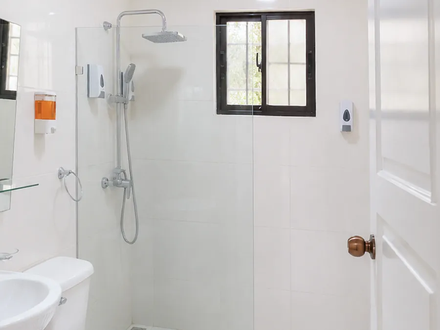 The second bathroom and its rain shower