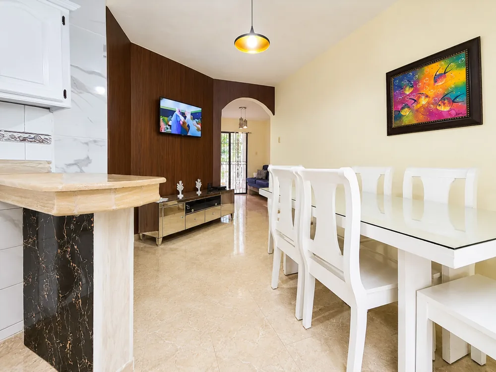 The indoor dining table set for a group