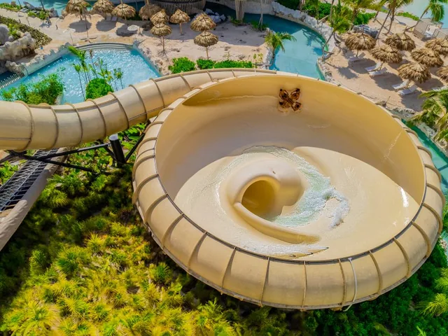 Water slides and a lazy river seen from above at the water park